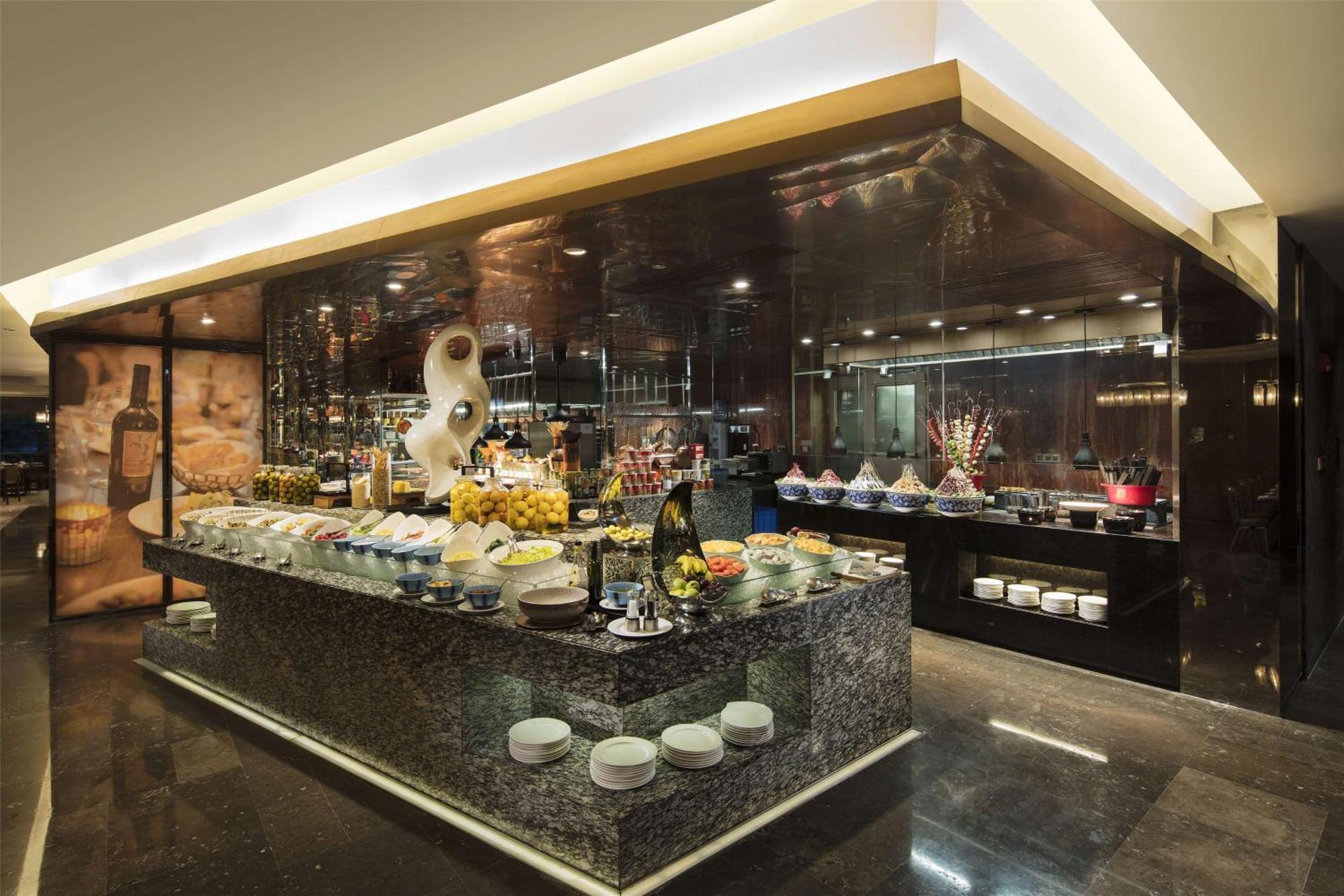 فندق هيلتون قوانغتشو تيانهي المظهر الخارجي الصورة The buffet at the lobby