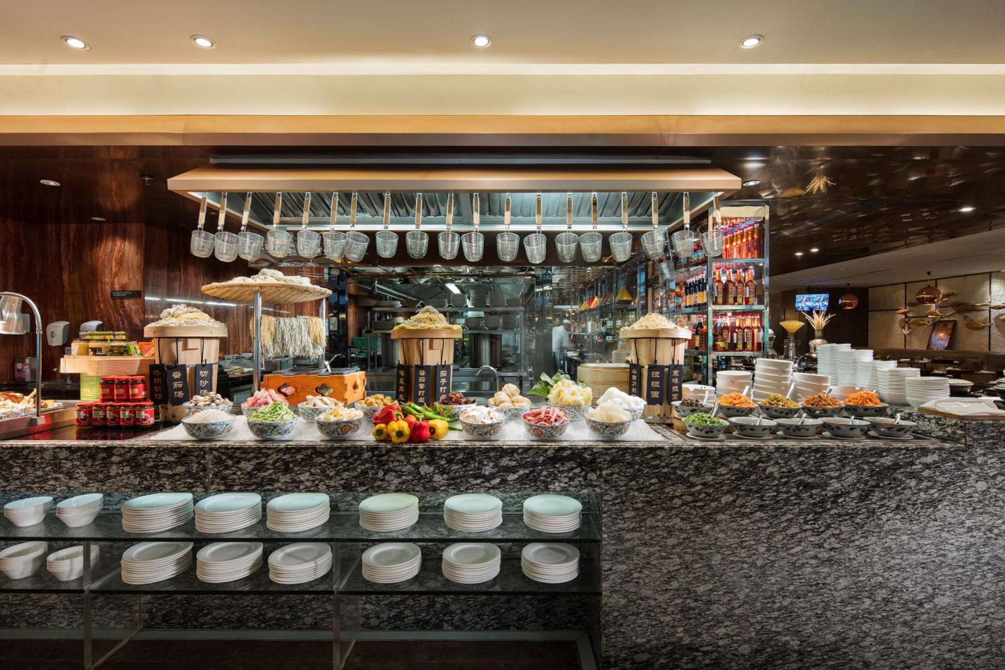 فندق هيلتون قوانغتشو تيانهي المظهر الخارجي الصورة A buffet at a hotel